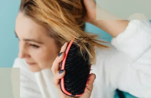 woman-brushing-hair-scalp-care
